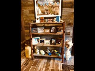Rustic made shelf with milk can fountain . made by Micano's. 