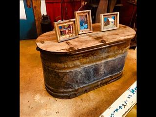 This water trough table is fun and doubles as a storage. The pieces run close to 400.00 depending on(..)