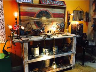 Trestle table with vintage door top. 689.00. This thing looks like it came out of your grandpa's gar(..)