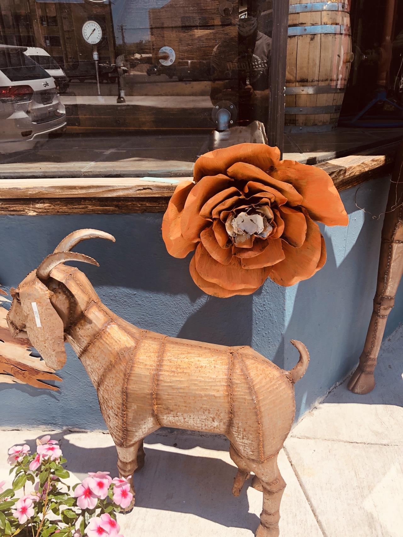 Those goats are always after your flowers . Animal art .,