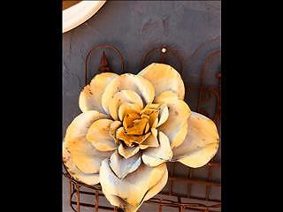 Big flowers � that beg hello’s from neighbors . Metal art flowers . Giant roses � and (..)