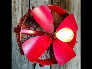 One of my favorite upcycles an old snare drum with a fan and red paint. 