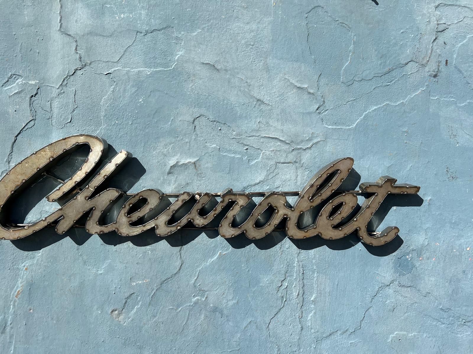 Chevrolet script sheet metal sign  0